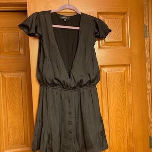 Selling a black romper, never been worn.